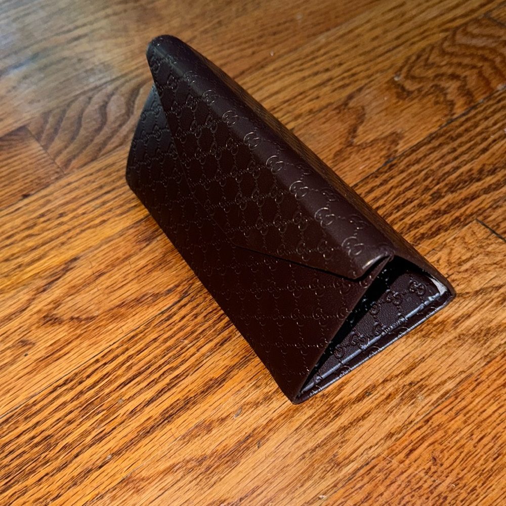 Gucci sunglasses case and cleaning cloth. Never used